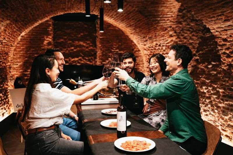 Madrid: Guided Tapas and Wine Tour with Rooftop Views - Starting at Plaza de San Miguel and entering old Madrid