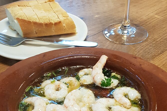 Madrid History Food Tour: Tapas & Drinks Tasting - Croquettes, empanadillas, and fried cod