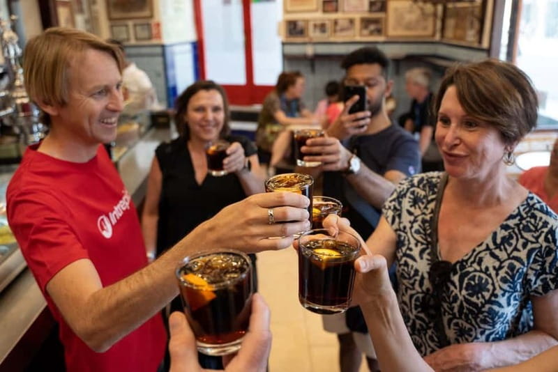 Madrid: Local Tapas, Drinks, and Hidden Gems Walking Tour - Plaza Mayor and the famous calamari sandwich