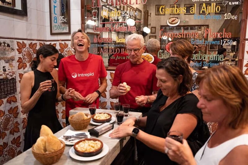 Madrid: Local Tapas, Drinks, and Hidden Gems Walking Tour - Shrimp, Spanish wine, and a local dessert