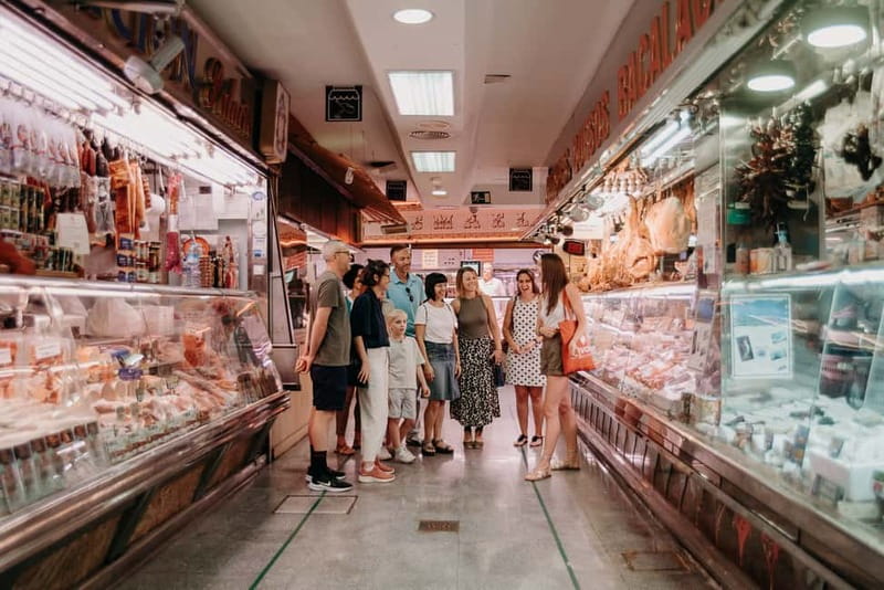 Madrid: Paella & Tapas Cooking Class and Market Visit - The guides shape the experience