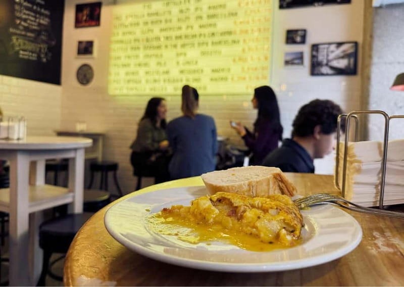 Madrid: Prado Museum and Tapas & Wine Tour with Local Guide - Walking through the Literary Quarter