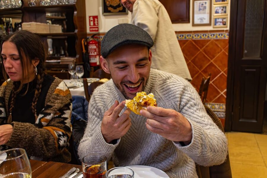 Madrid's Iconic Tapas, Taverns & History Experience - Meeting the guide near Teatro Real
