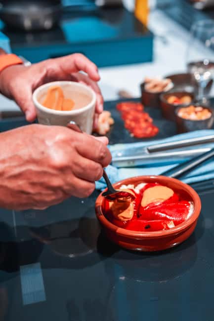 Madrid: Tapas Cooking Class with bottomless Wine Pairing - Making Five Spanish Tapas in Pairs