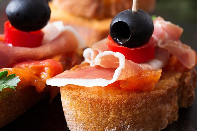 Madrid Tapas Experience Walking Tour - Drinks, wineskins, and the rebujito lesson
