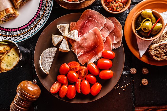 Madrid Tapas Experience Walking Tour - The jamón comparison at a local shop