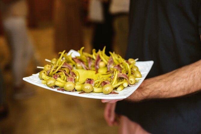 Madrid Tapas & Paella Cooking Experience with Local Market Visit - The guides shape the experience