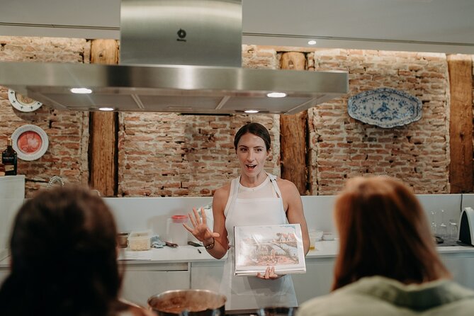 Madrid Tapas & Paella Cooking Experience with Local Market Visit - Timing, meeting point, and cancellation