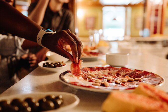 Madrid Tapas & Taverns Small Group Food & History Tour - Plaza Mayor and Puerta del Sol add the city’s public story