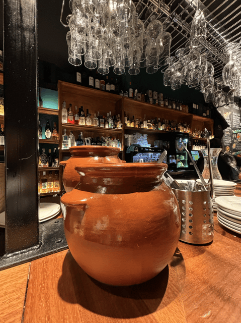Madrid: Tapas Tour, Drinks and rooftop with panoramic views - A former Arab bathhouse and a Madrid cave