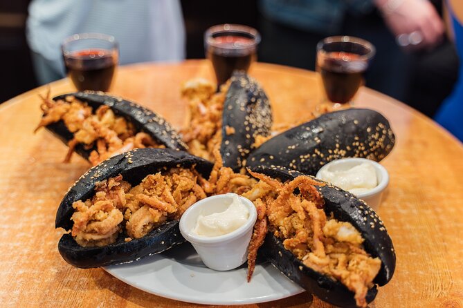 Madrid: Tapas Walking Tour with Food and Drinks Included - How the food and drink package affects the value