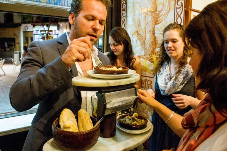 Madrid: Tapas & Wine Tasting Tour with Local Guide - Four old bars, twelve tapas, and one useful Madrid lesson