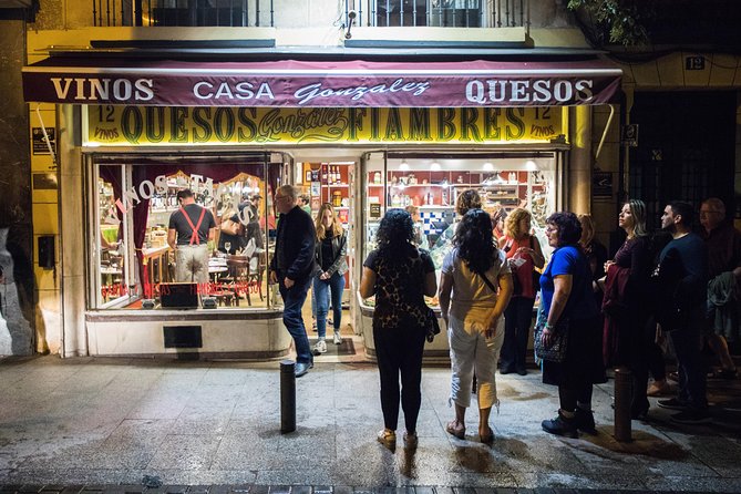 Madrid Tapas & Wine Tasting Walking Tour – Small Group Local Bars - Plaza del Ángel and the wine shop behind the bottles