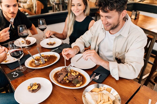 Madrid Tapas & Wine Tour with Rooftop Views and Local Guide - Beef cheeks and the old dining house