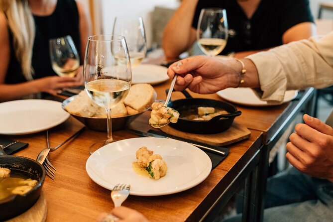 Madrid Tapas & Wine Tour with Rooftop Views and Local Guide - The guides make the difference