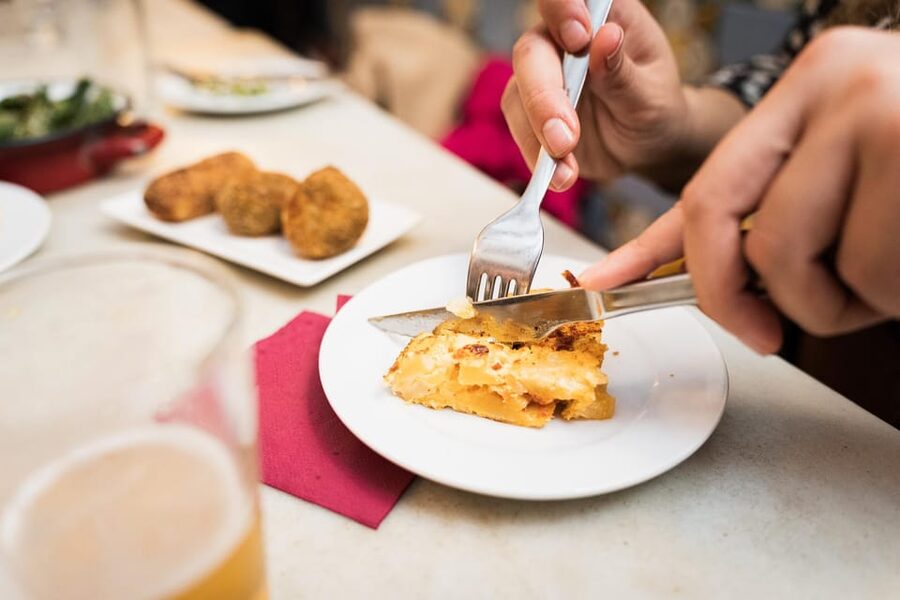 Malaga: Food Tour with Local Guide, Tapas, and Drinks - Russian salad and the everyday side of Spanish food
