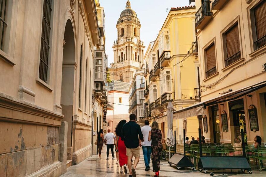 Malaga's tradition and tapas tour with Official Guide - Walking past Larios Street, the cathedral, and the Picasso Museum