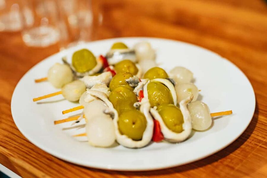 Malaga's tradition and tapas tour with Official Guide - The first restaurant: three traditional dishes and a drink