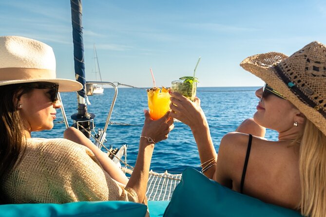 Mallorca Catamaran Small Group Cruise with Tapas 4-hours - Meeting Helmut and Nadine at D-Marin Palma Cuarentena