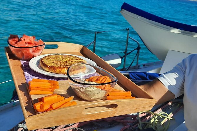 Mallorca Sailing Adventure with Snorkeling, Snacks & Drinks - Simple Food, Wine, and Drinks on Deck