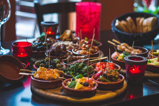 Marbella Food Tour: Tapas, Drinks and Delights with a Local - Anchovies and ham croquettes at Plaza de la Victoria