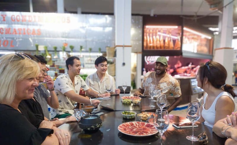 Marbella: Guided Market Tour with Tapas and Wine Pairings - From bocata to cured ham and cheese