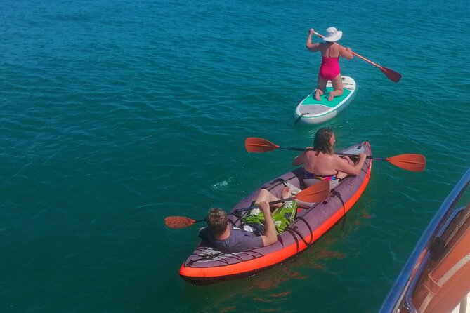 Morning private charter with drinks tapas, paddle boards &kayak - The crew: Khaled and Simao