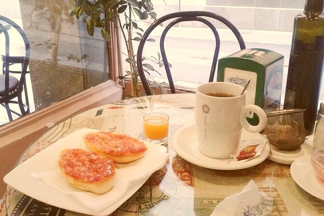 Morning Walk with Breakfast, Market tastings & Authentic Flavoured Tapas Lunch - Across Triana Bridge and into the market