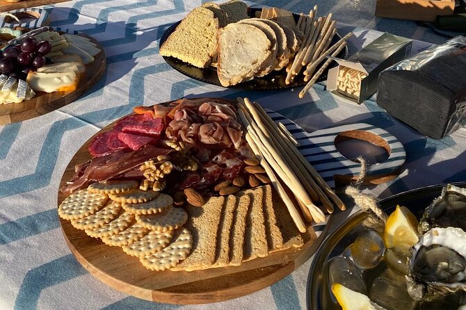 Olhão: Private Boat Tour, at Sunset with Oysters/Tapas and Drinks - Armona Island from the water