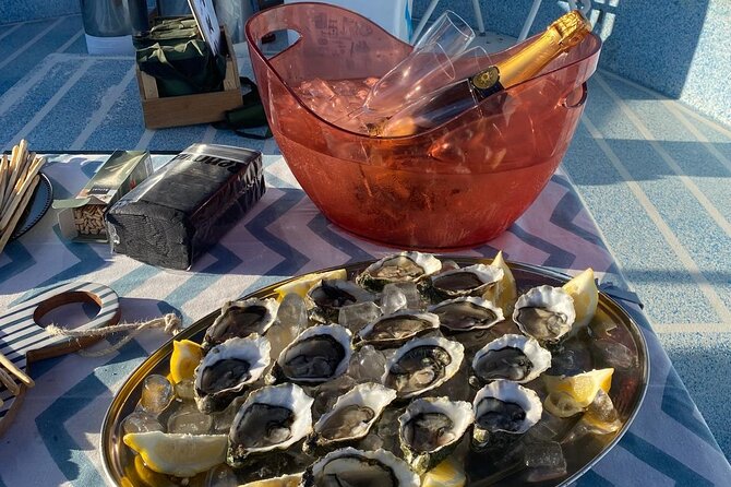 Olhão: Private Boat Tour, at Sunset with Oysters/Tapas and Drinks - The oyster tasting is the evening’s centerpiece