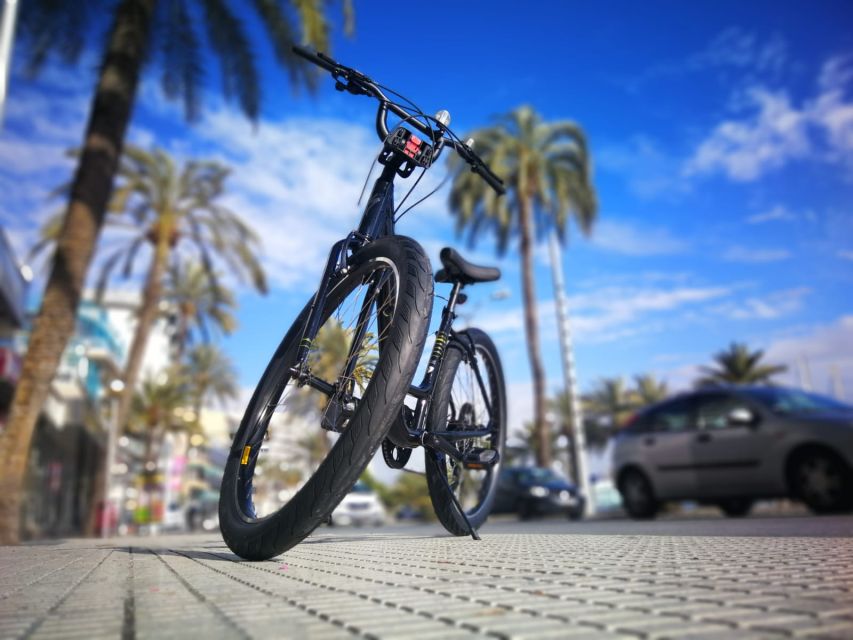 Palma de Mallorca: Guided Bicycle Tour with Tapas & a Drink - Following the coast toward La Seu