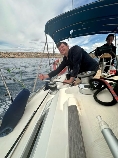 Palma de Mallorca: Sailing Boat Trip with Skipper & Tapas - The anchor stop for swimming and snorkeling