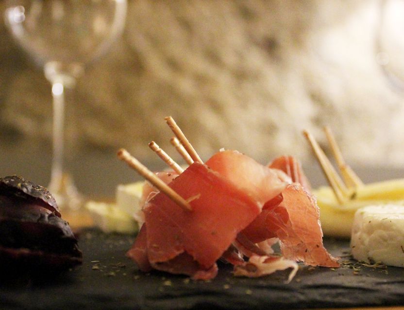 Porto: Wine Tasting with Tapas Walking Tour - Five wines and a plate of Portuguese bites