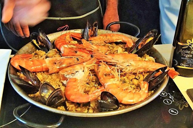 Premium Paella Cooking Class & 10 Spanish Tapas - Cooking Spanish omelette, paella, and Catalan cream