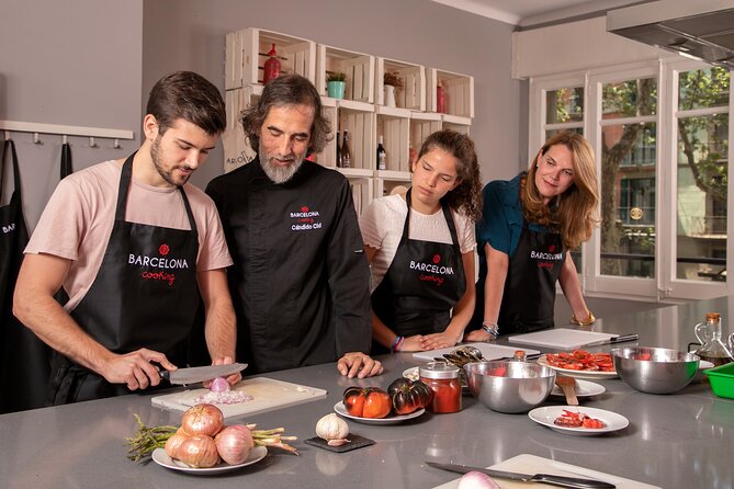 Premium Paella & Tapas Feast: Unlimited Wine & Rambla Views - Cooking Spanish dishes in a small group
