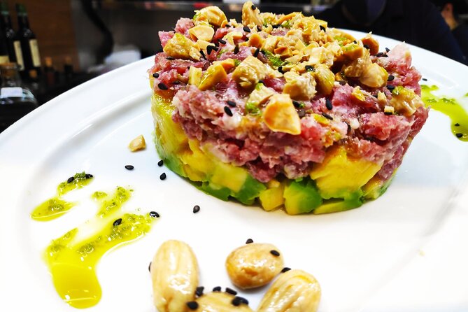 PREMIUM TAPAS TOUR: Paella, Market Tastings, and Winery - Paella and salad near the Cathedral
