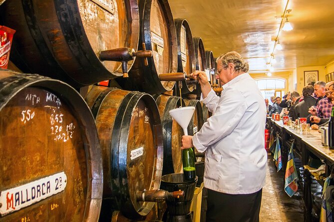 PREMIUM TAPAS TOUR: Paella, Tapas, Winery and Flamenco - Walking through Marqués de Larios and the old center