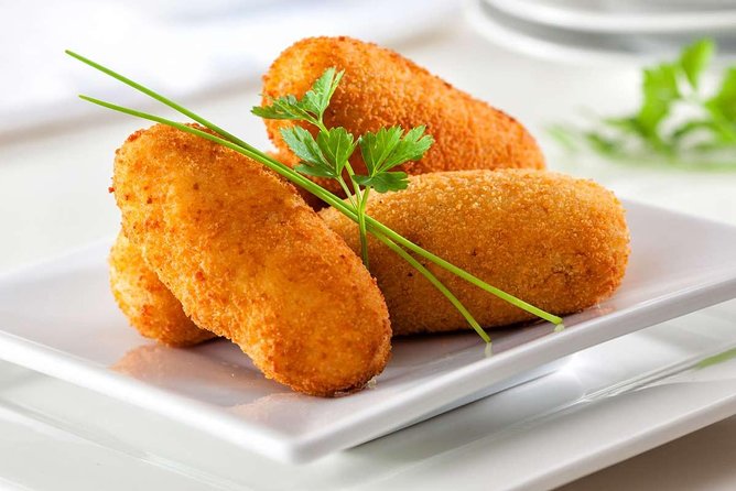 PREMIUM TAPAS TOUR: Tapas, Paella and Winery - Pasaje de Chinitas and the culture of tapas