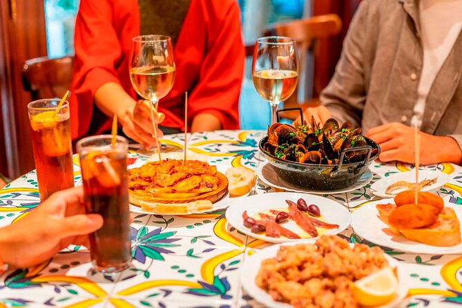 Private Tour: Tapas, Wine & Flamenco Show in Barcelona’s Old Town - Two bars, drinks, and a generous but uneven meal