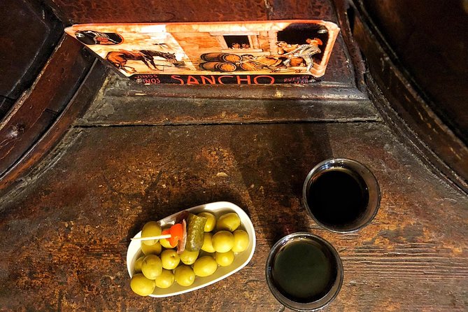 Private Wine & Gourmet Tapas Tour in Madrid with Sommelier - Cava and still wines at the third tavern