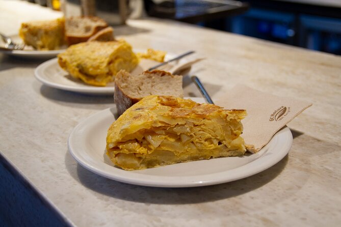 San Sebastian Food & Pintxos Tour with 12 Food & Drinks Tastings - Walking through Belle Époque San Sebastián