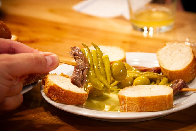 San Sebastian Food & Pintxos Tour with 12 Food & Drinks Tastings - Pintxos, oysters, foie gras, and the secret dish
