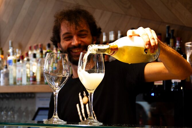 San Sebastian Food & Pintxos Tour with 12 Food & Drinks Tastings - Wine, txakoli, Rioja, and the rhythm of the evening