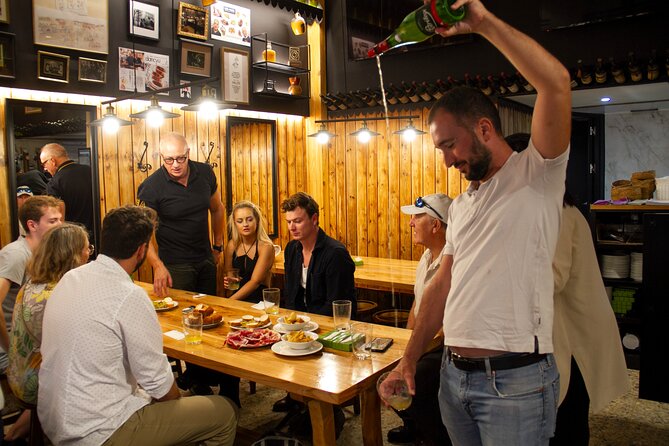 San Sebastian Food & Pintxos Tour with 12 Food & Drinks Tastings - From the beach and market toward Kursaal