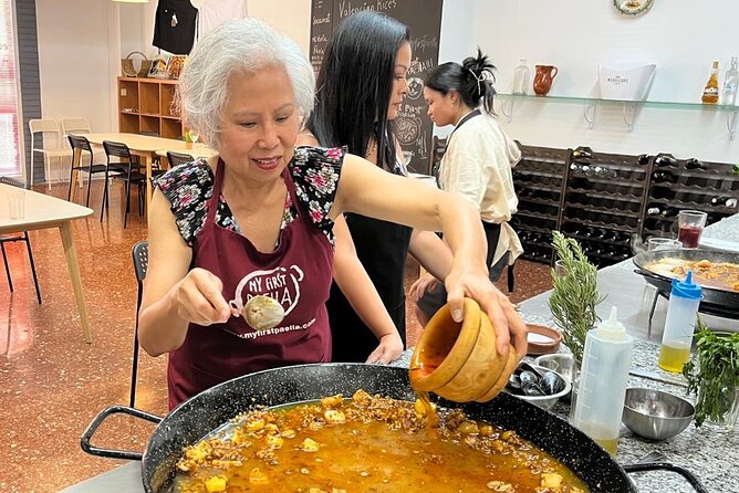 Seafood paella cooking class, tapas and visit to Ruzafa market. - Sangria, tapas, and a friendly start