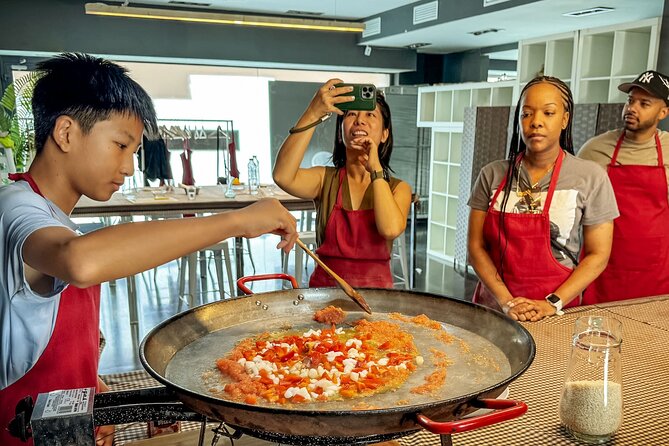 Seafood Paella Maestro with Tapas and Sangria - Building the seafood paella together