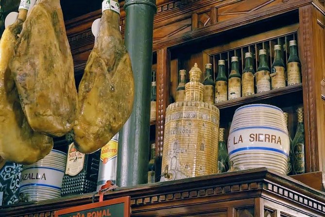 Sevilla Food Tour: Tapas, Wine, History & Traditions - Walking through Seville’s old center