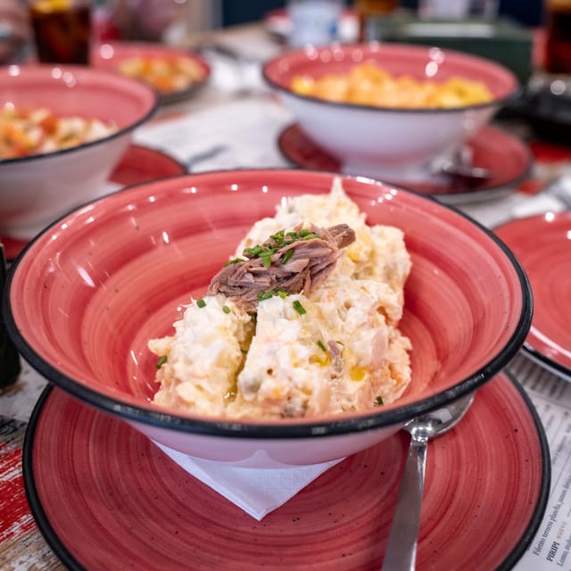 Seville Adventure: Historic Walking Tour & Traditional Tapas - Puerta del Perdón and the old silk market