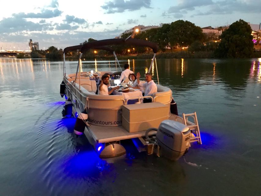 Seville: Exclusive River Boat Tour with Tapas - Passing beneath Isabel II Bridge into historic Seville