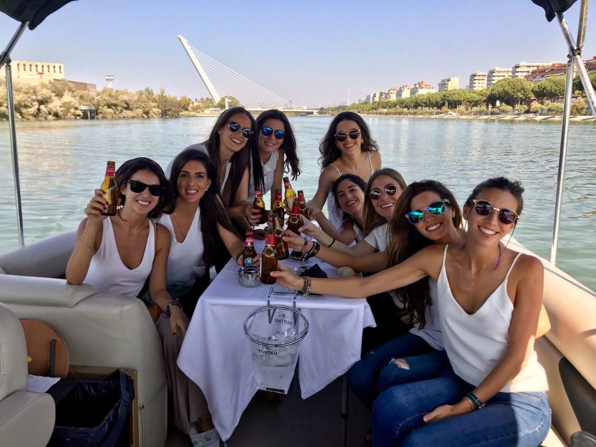 Seville: Exclusive River Boat Tour with Tapas - The bullring, Torre del Oro, and San Telmo Palace